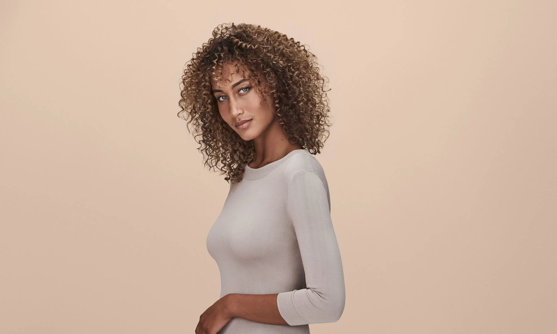 Image of model with healthy curls