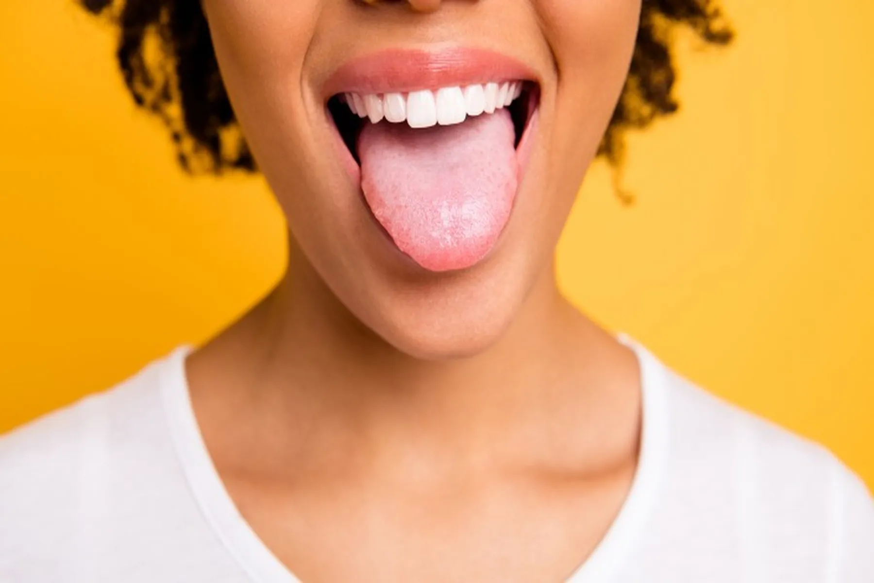 Woman sticking out her tongue.