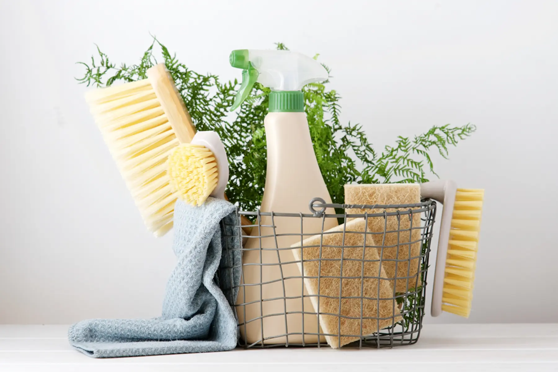 A basket of natural cleaning products