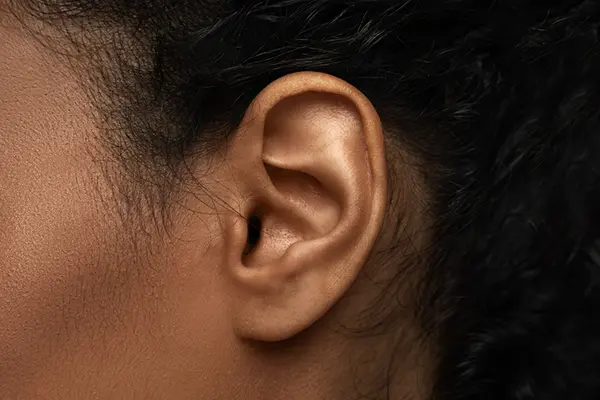 A close-up of a woman's ear