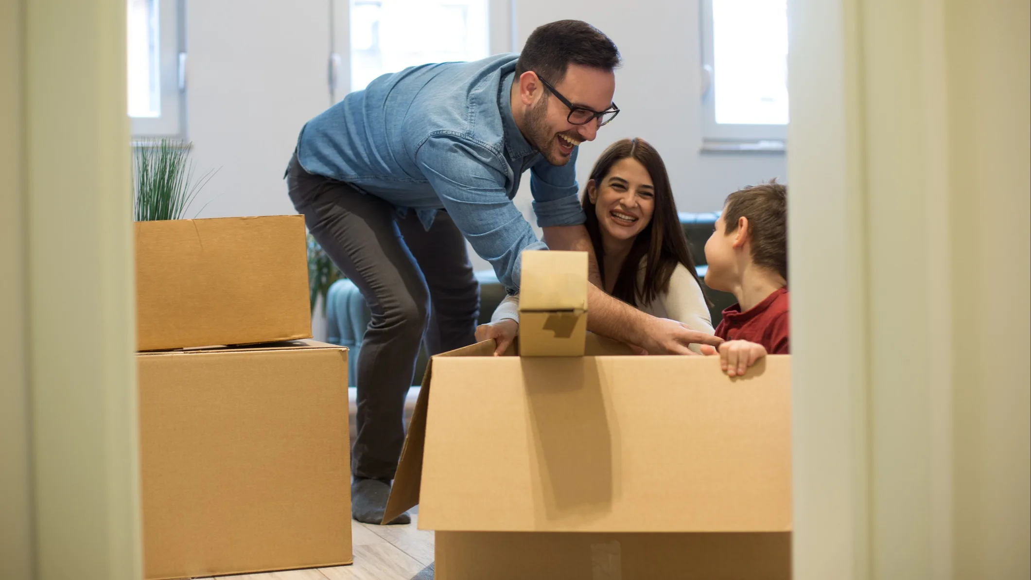 A family unpacking in their new home