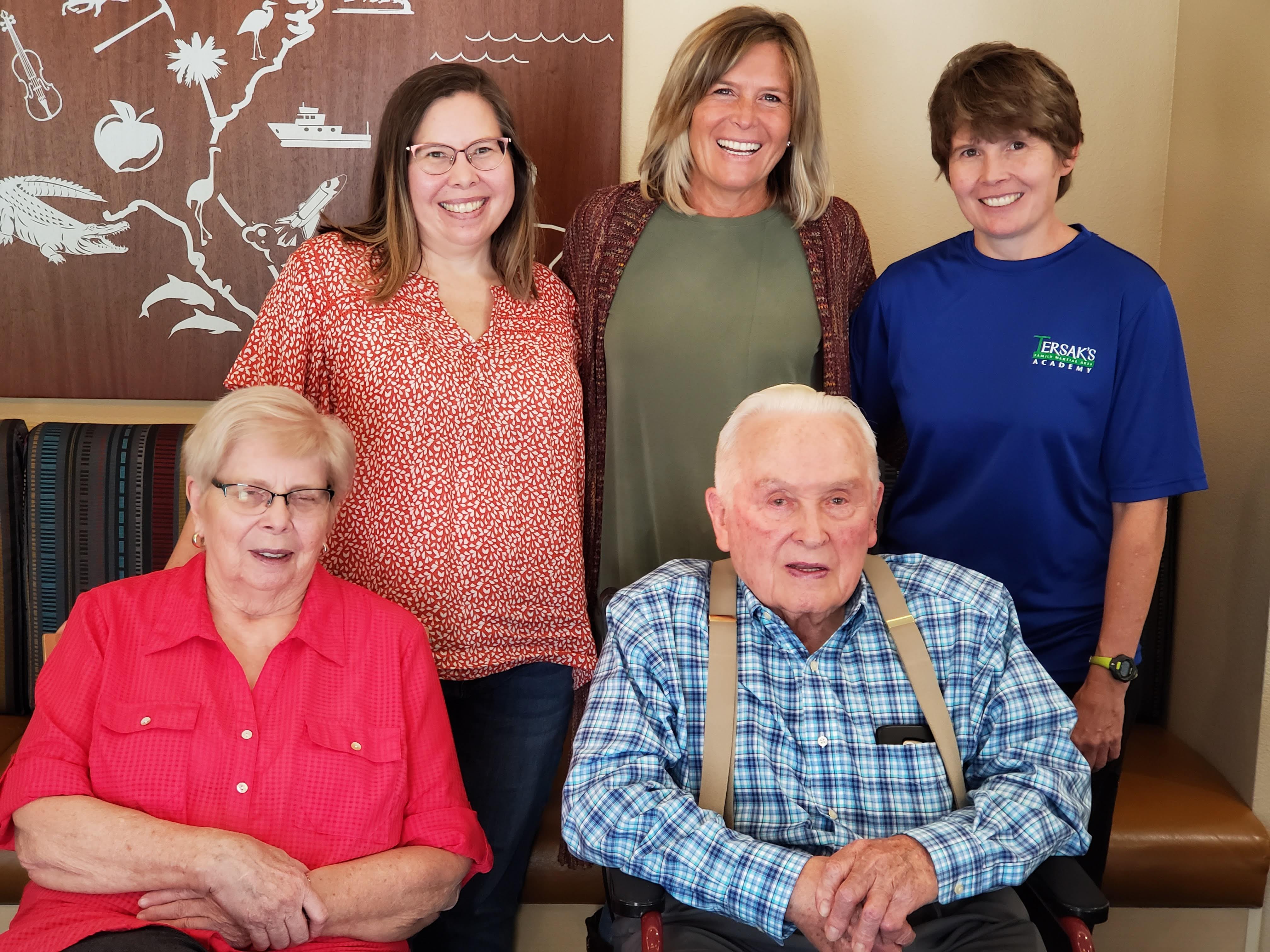 Anne Peshka poses with her birth family