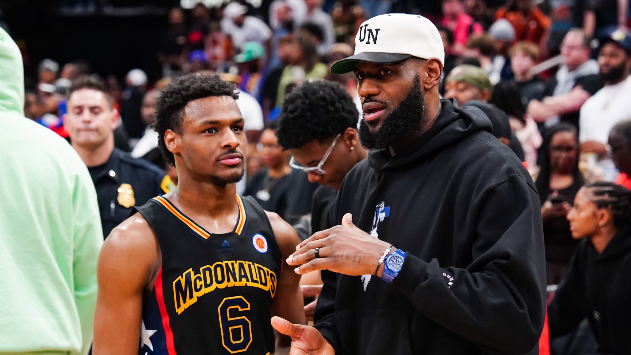 LeBron James reacts to Bronny James dunking over Bryce James at McDonald's  All-American JamFest 