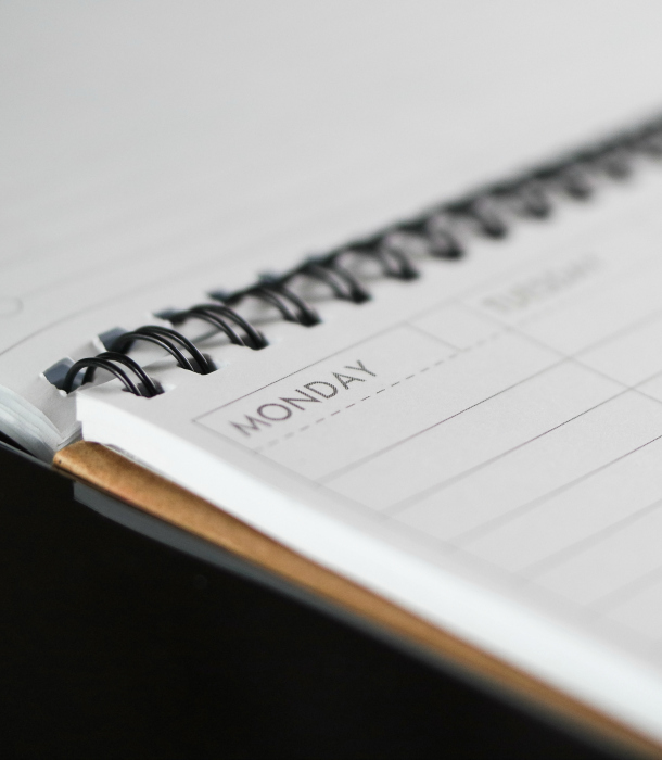 corner-of-day-planner-on-desk