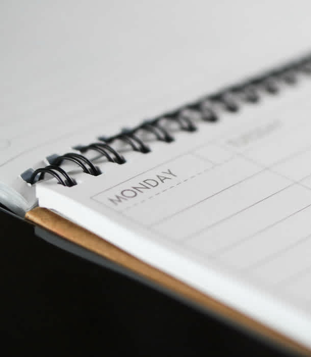 corner-of-day-planner-on-desk corner-of-day-planner-on-desk