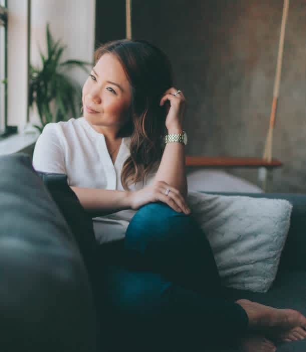 woman-rests-on-sofa woman-rests-on-sofa