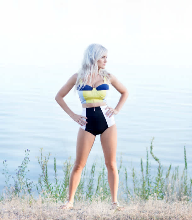 woman-poses-in-swimsuit-near-lake woman-poses-in-swimsuit-near-lake