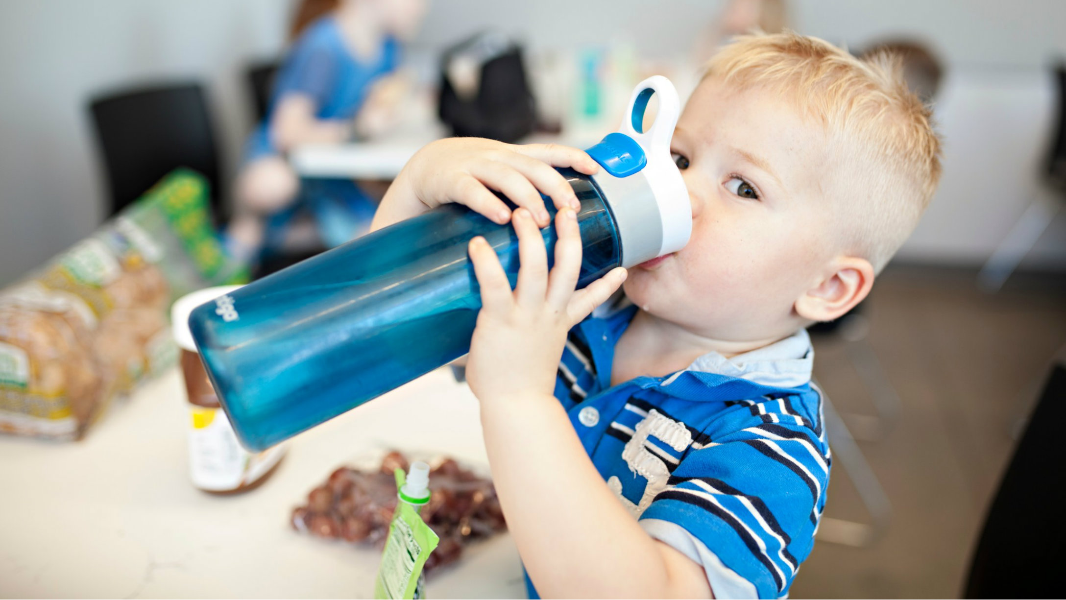 drinking a water bottle