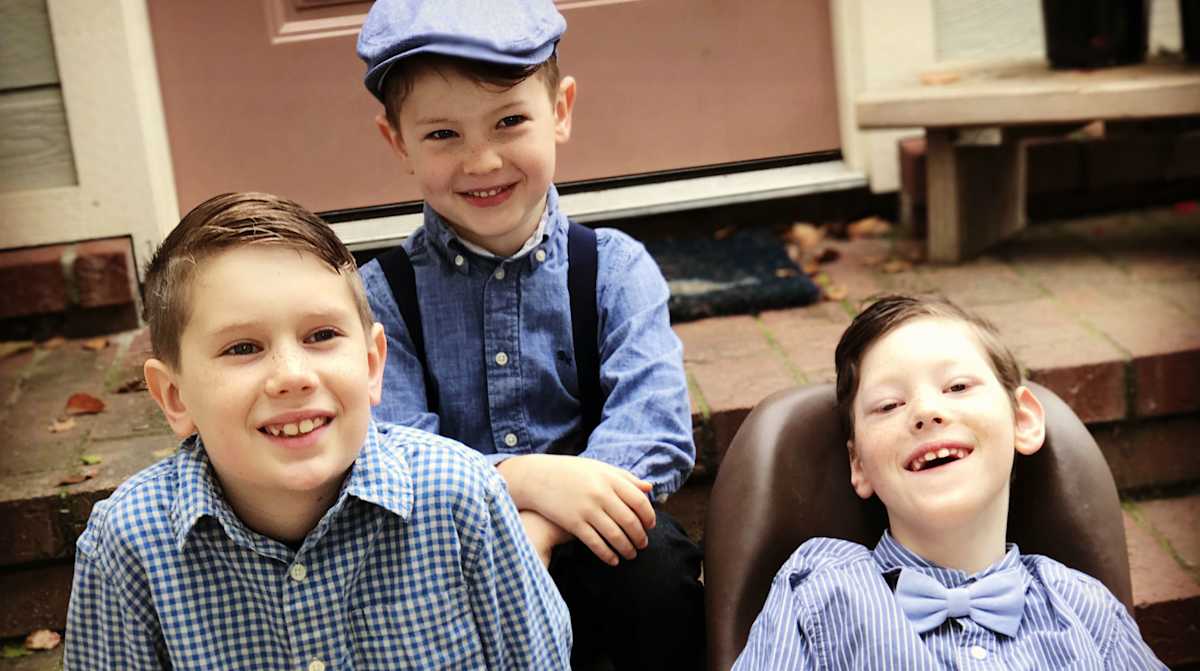 three-smiling-well-dressed-boys