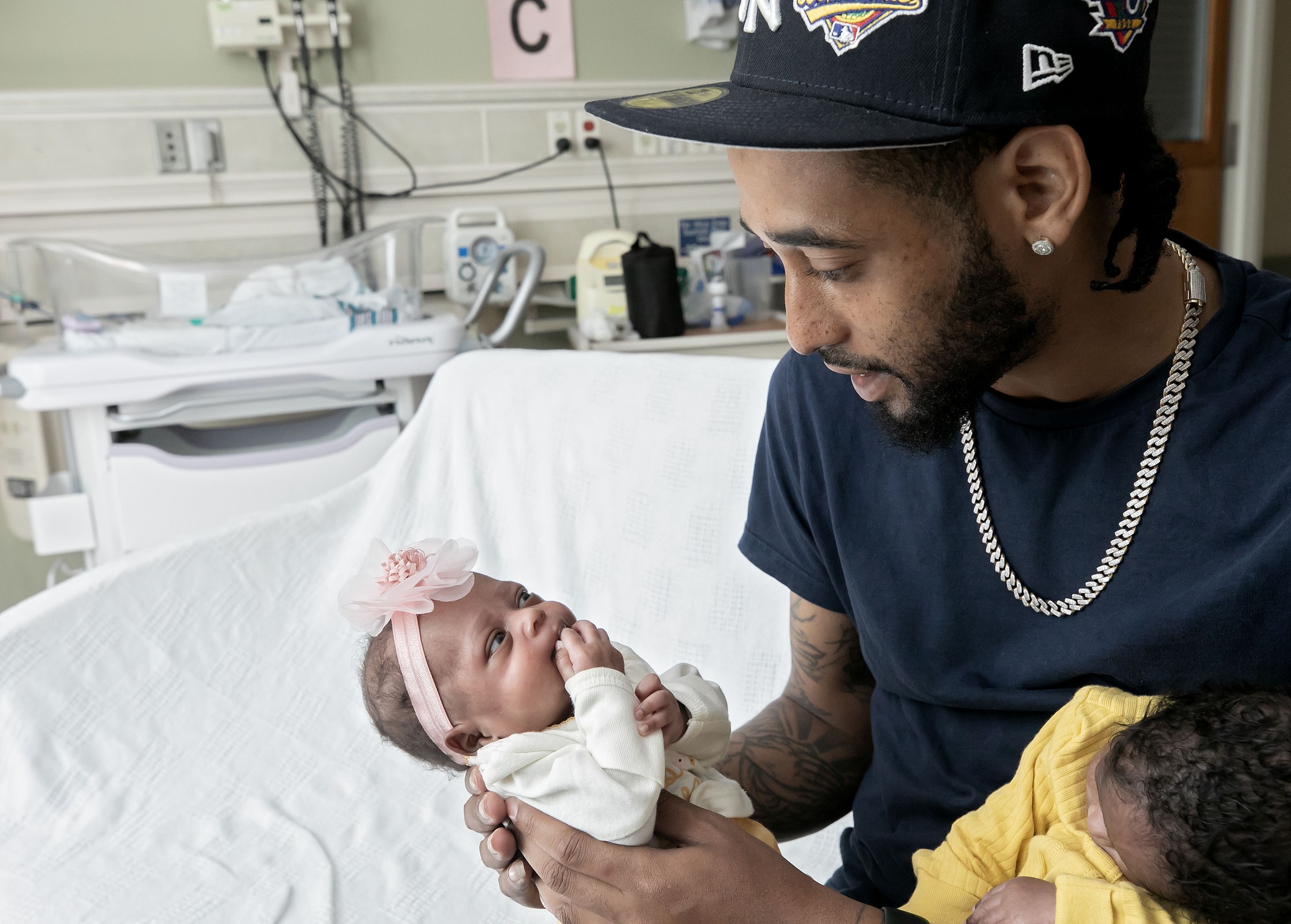 Lamar Logan with one of the troplets