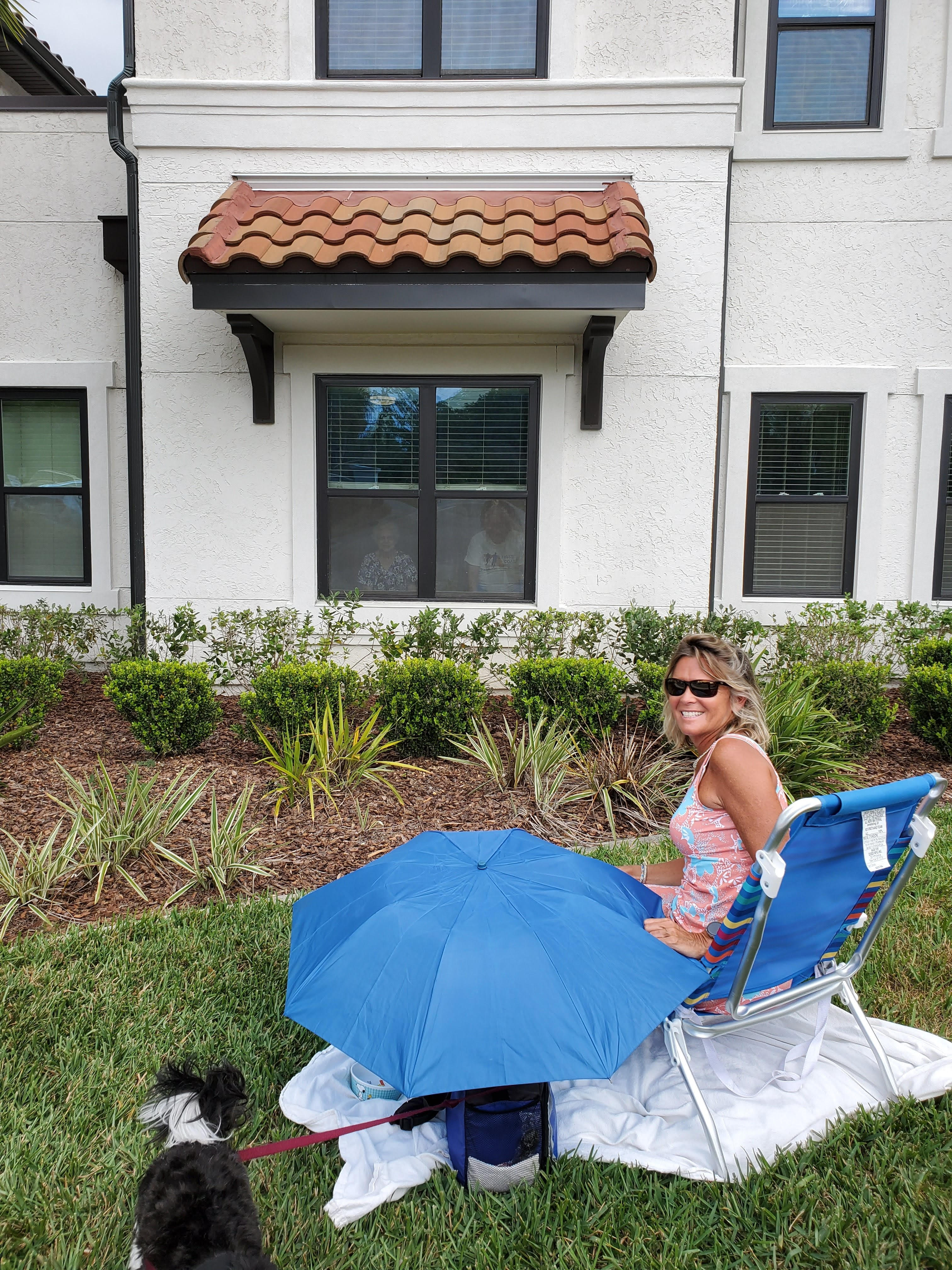 Anne outside of her dad's assisted living facility