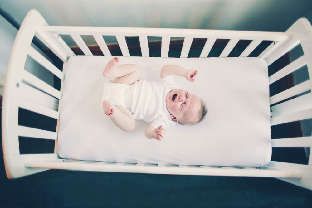 baby screams in crib