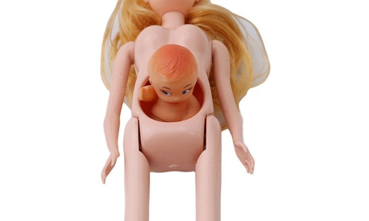 Pregnant doll sale