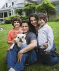 top-10-family-friendly-dogs5c - Portrait of family with dog outdoors