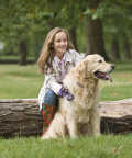 top-10-family-friendly-dogs10c - Girl sitting with dog
