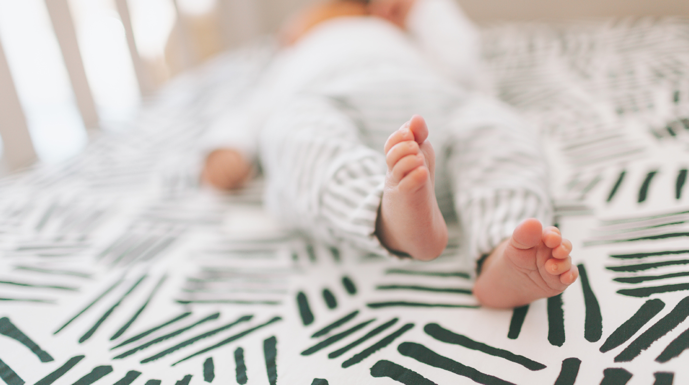 The Easiest Way To Change Your Baby's Crib Bedding
