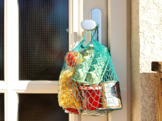 Content Einkaufstüte an Tür