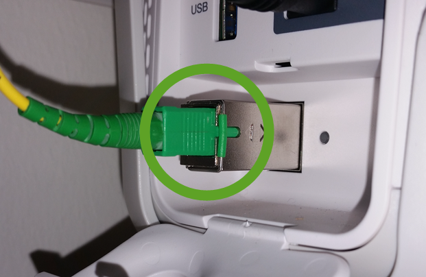 Green tab on fiber connector