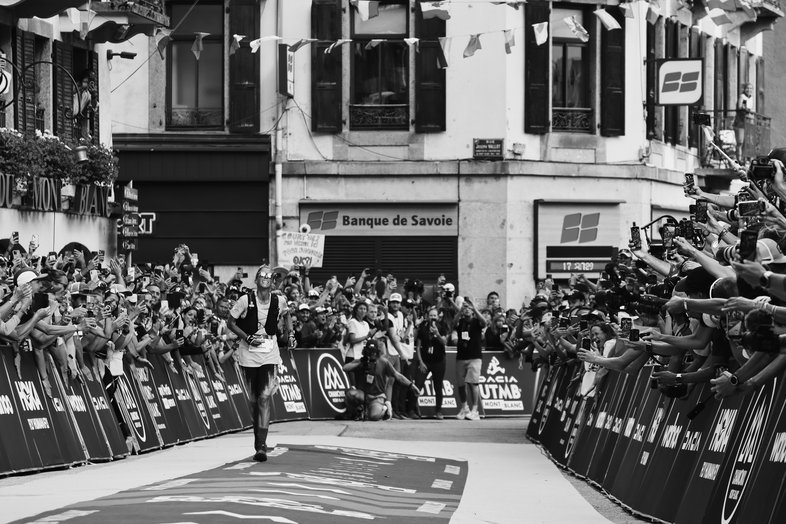 Courtney Dauwalter on the final straight before being crowned the female winner of UTMB 2023. Photograph: Richard Miller
