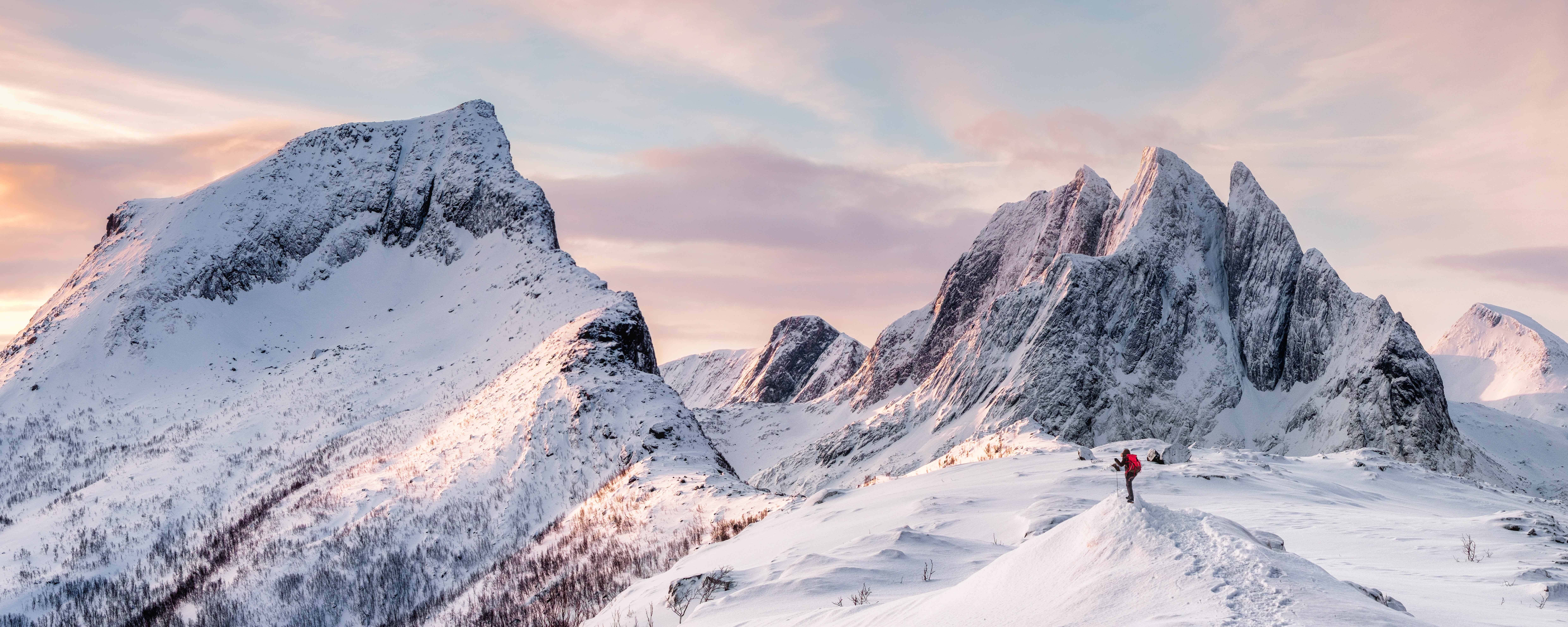A mountaineer heading for their objective at sunrise. Photo: Mumemories, Shutterstock