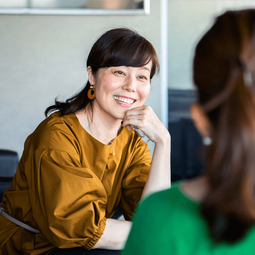 Person smiling while presenting