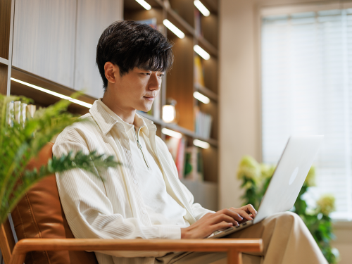 a man using a laptop