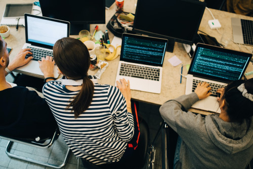 people working in small office