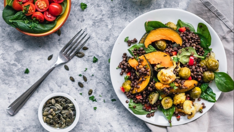 Lentil salad with side of tomatoes and spinach