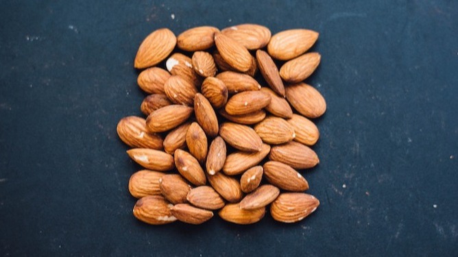 Almonds on a slate background