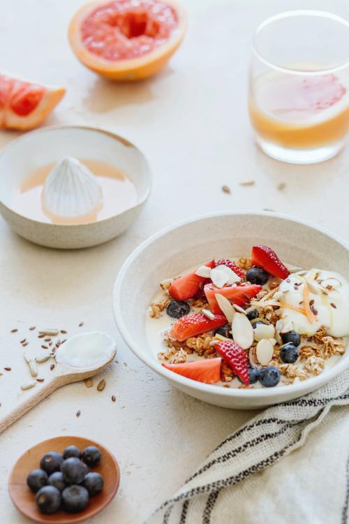 Yogurt and granola topped with berries