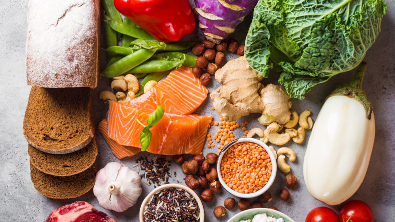 assortment of salmon, vegetables, and whole grains