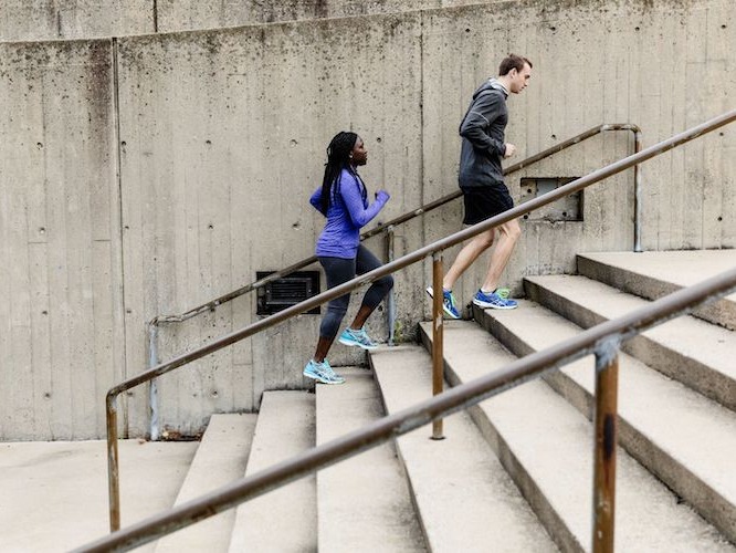 Runkeeper - two people running up stairs