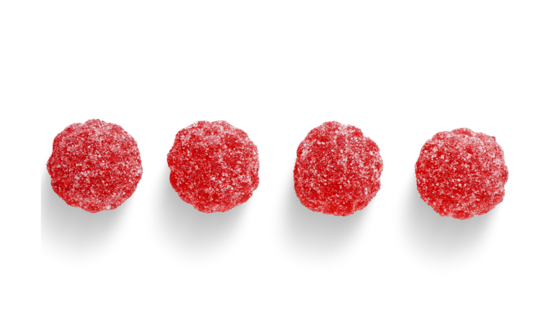 4 red cycling chews on a white background