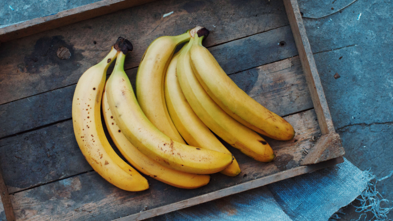 Bunch of bananas on a blue background