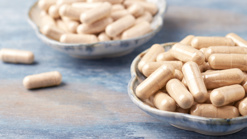 Ashwagandha supplements in a bowl 