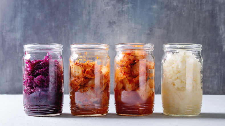 Probiotic foods in glass jars 