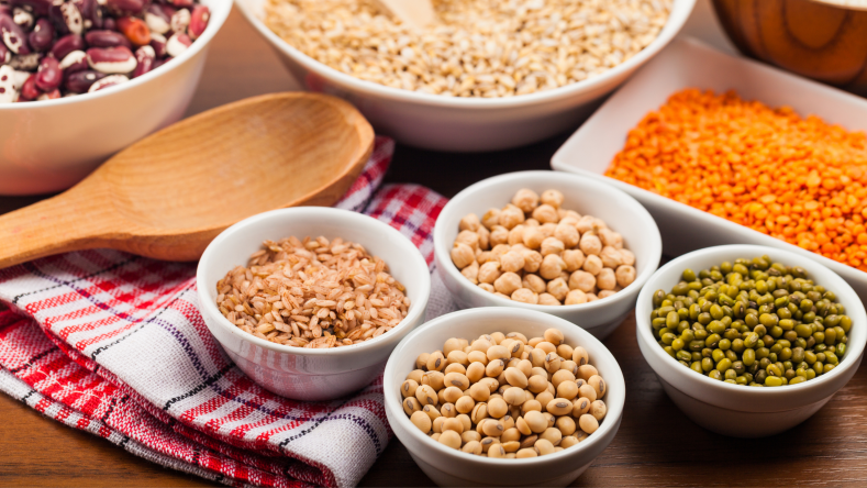 lentils, chickpeas, and other beans and legumes separated into bowls