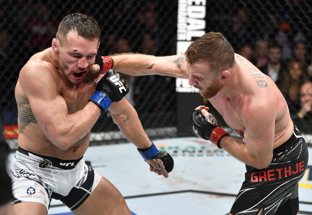 Justin Gaethje lands a right cross on Michael Chandler in an exciting lightweight bout. Photo by Jeff Bottari Zuffa LLC