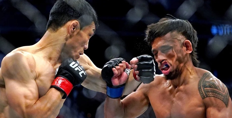Danaa Batgerel hits a left hook on Kevin Natividad. Photo by Jasen Vinlove USA TODAY Sports