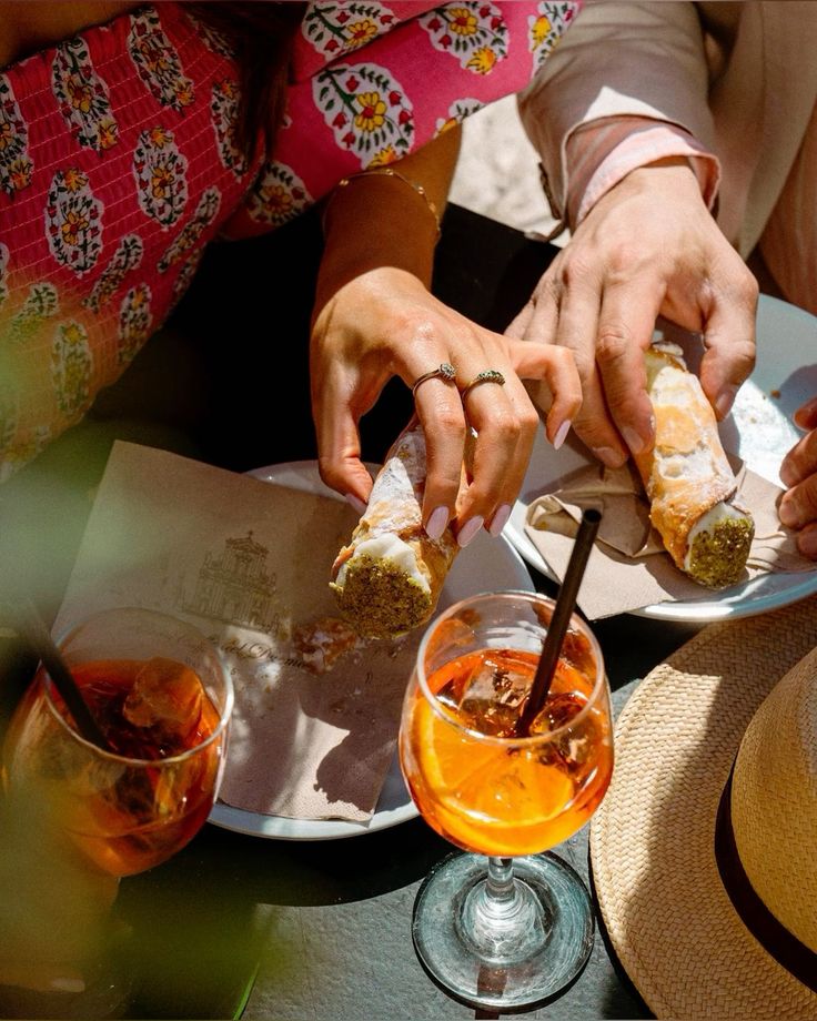 Enjoying an Aperol Spritz aperitivo during WalksDevour's Venice at Sunset: Cicchetti, Food & Wine Tour