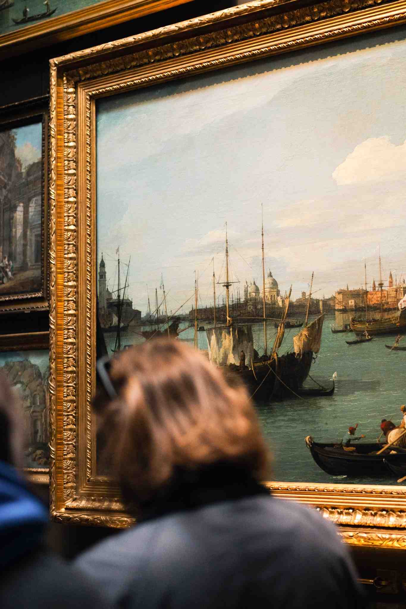 Art painting hanging on a wall inside a museum