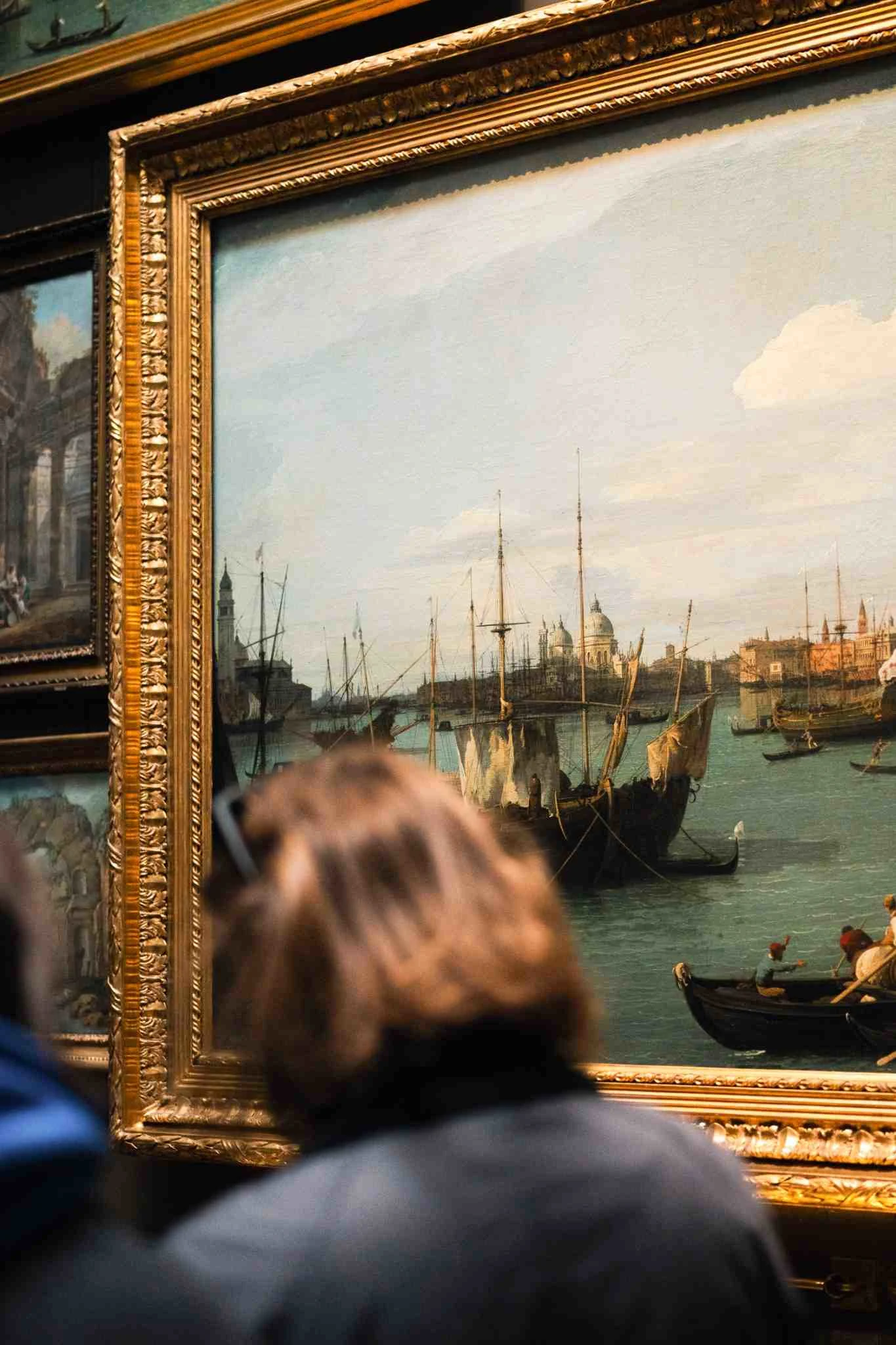 Art painting hanging on a wall inside a museum