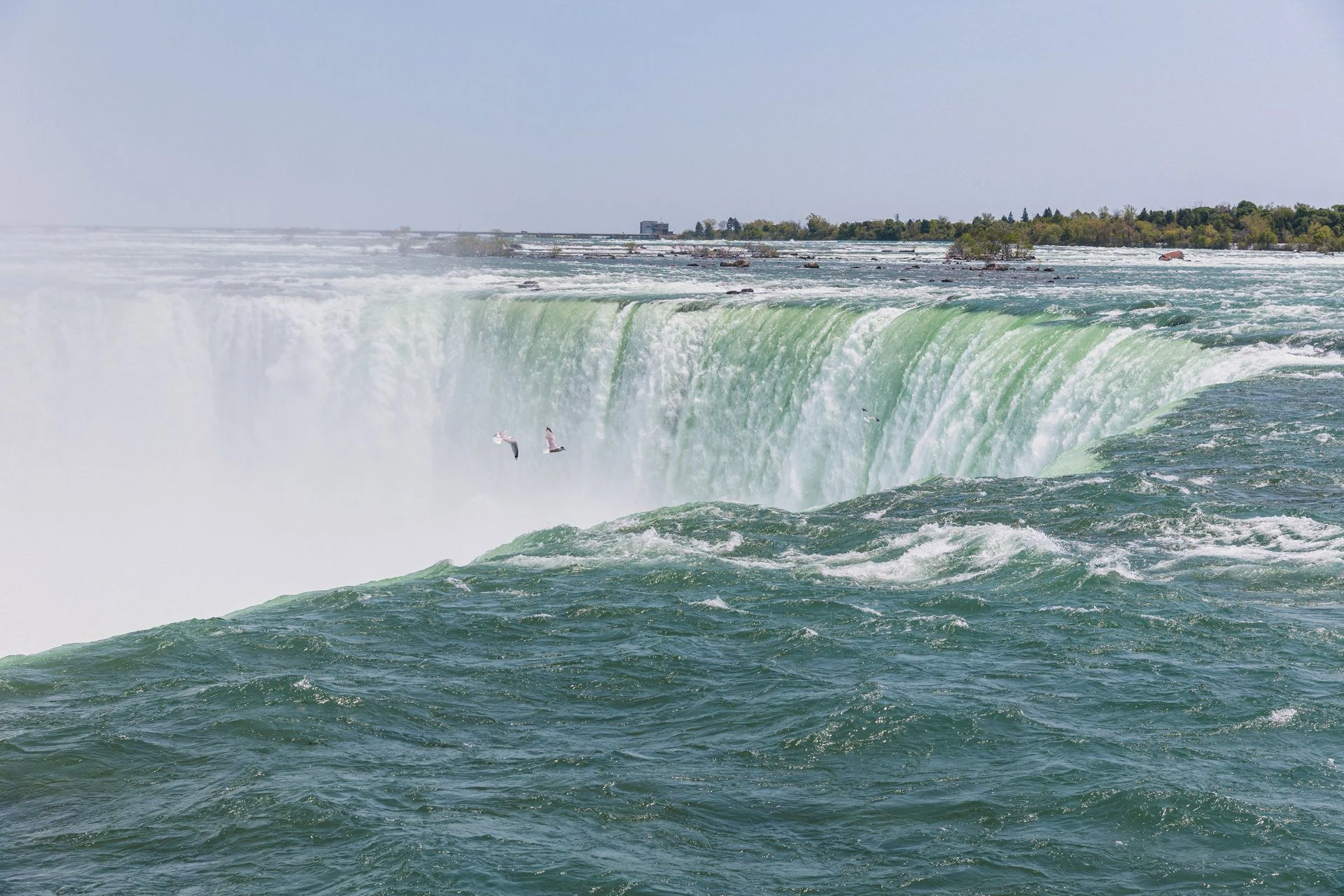 Niagara Falls, High and Low: The Skylon Tower and behind the cascade