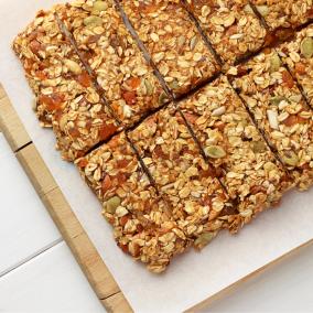 A platter of rich, roasted granola bars packed with healthy ingredients