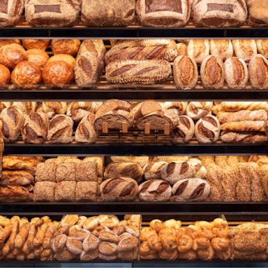 Five shelves of fresh baked goods