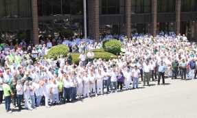 An outdoor photo of the Hearthside team celebrating.