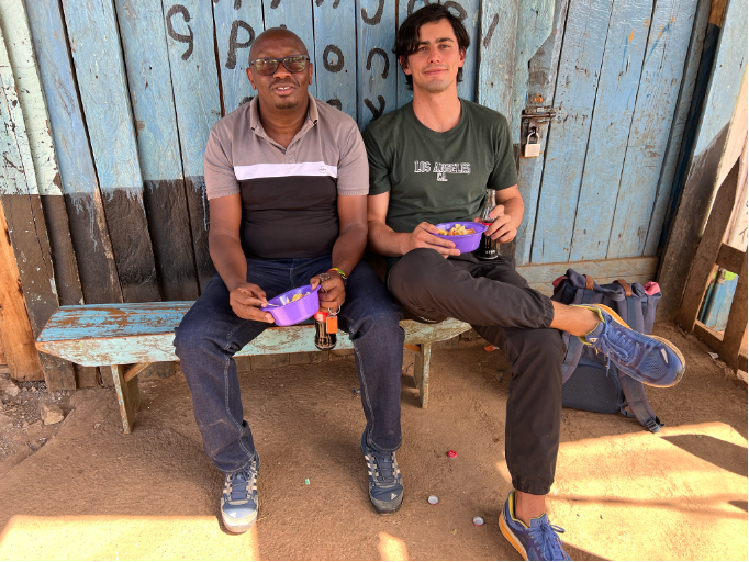 Having a snack at the side of the road with Akvo’s Francis.