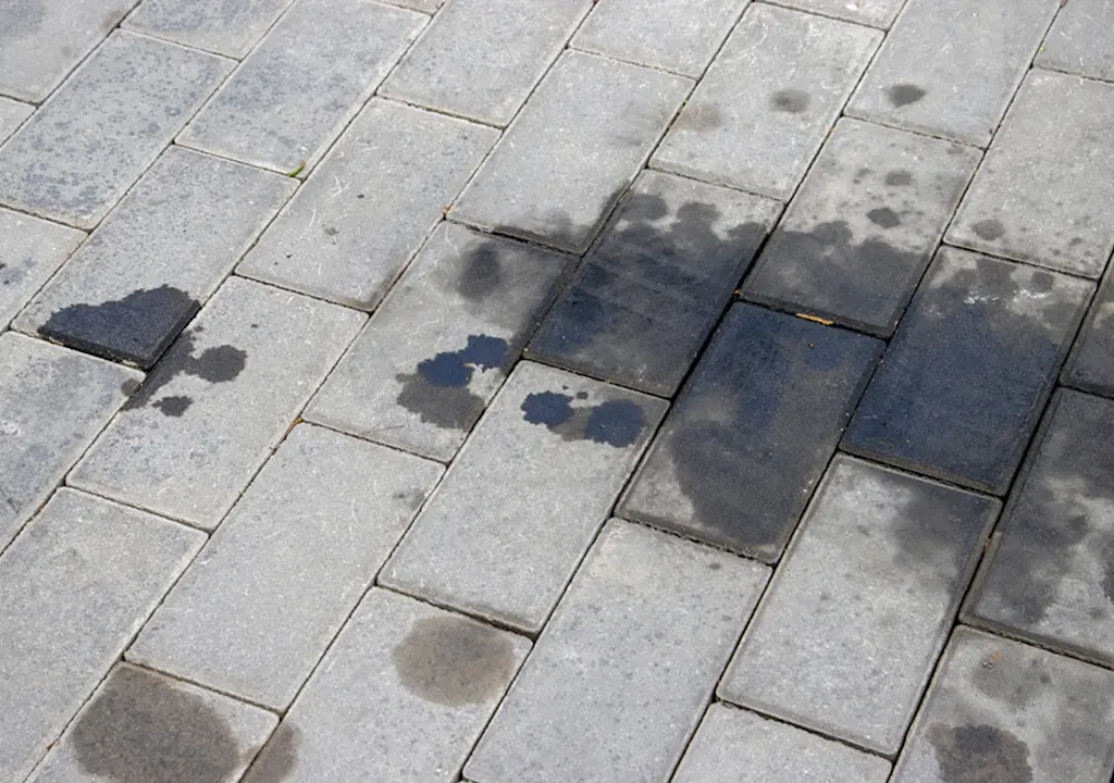 Oil stains on block paving