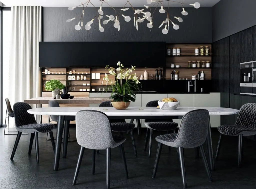 Black cabinets in dark kitchen design with white tables and accessories