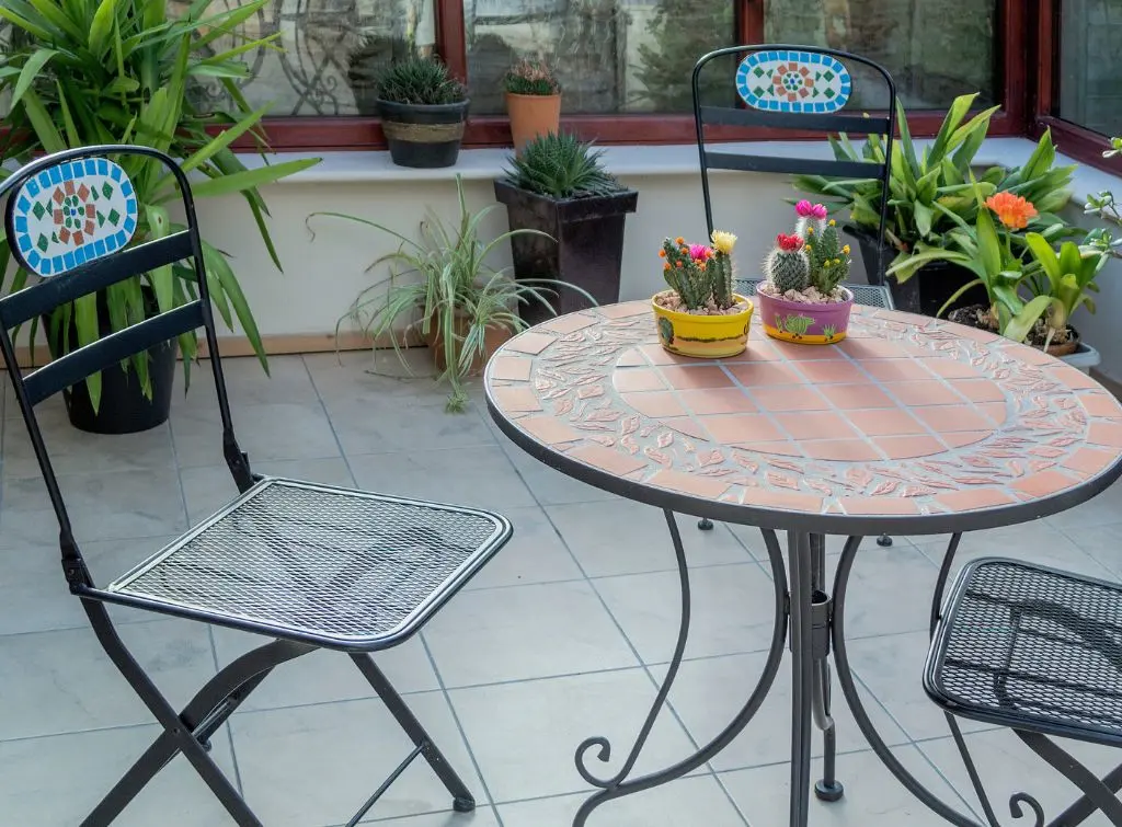 Colourful bistro table set for small conservatory decor ideas